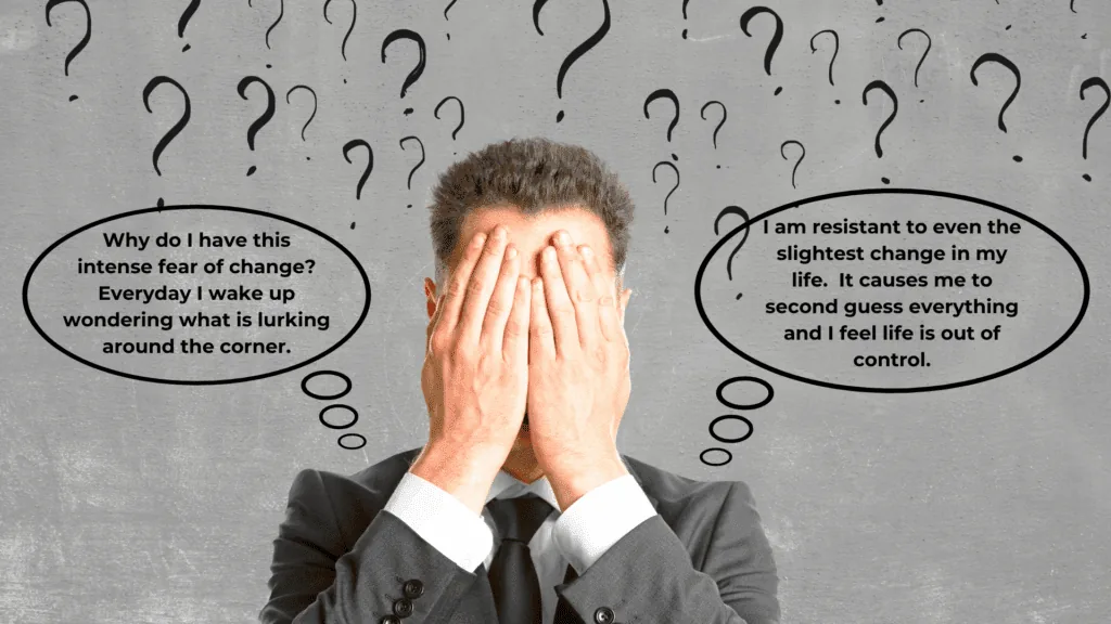 A man covers his face in fear, overwhelmed by the fear of change and second-guessing his decisions.