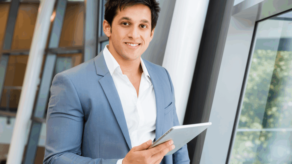 Business professional using a tablet, representing anticipation and continuous planning
