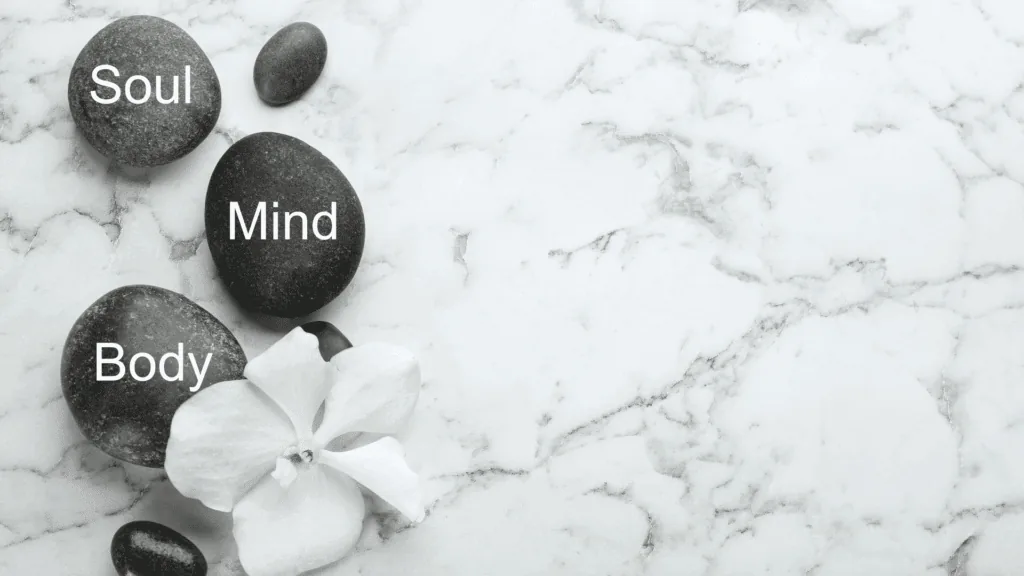 Mind body soul balance concept with zen stones and orchid.