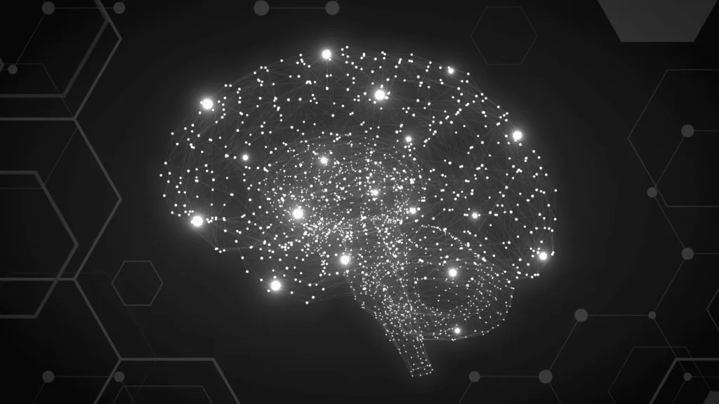 Digital neural network shaped like a brain glowing on a dark background, symbolizing the brain's complex and counterintuitive wiring.