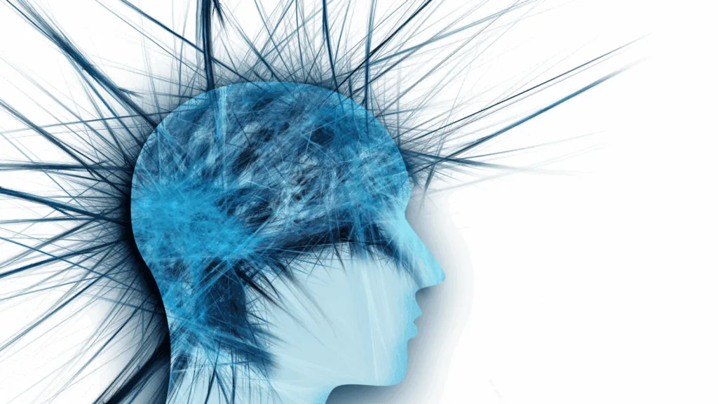 Blue neural energy radiating from a human head, symbolizing active brain function.