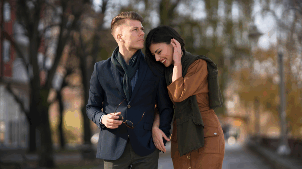 A couple walking arm in arm, highlighting the challenges of hyper independence in relationships.