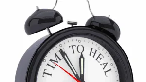 Close-up of a clock reading time for recovery, symbolizing strategies for how do I stop a panic attack effectively.