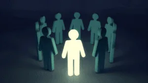 Glowing figure standing among others, symbolizing confident decision-making in the Neuroscience of Adaptive Leadership.
