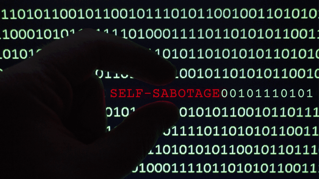 A computer screen with lines of numbers and then the word self-sabotage in red.