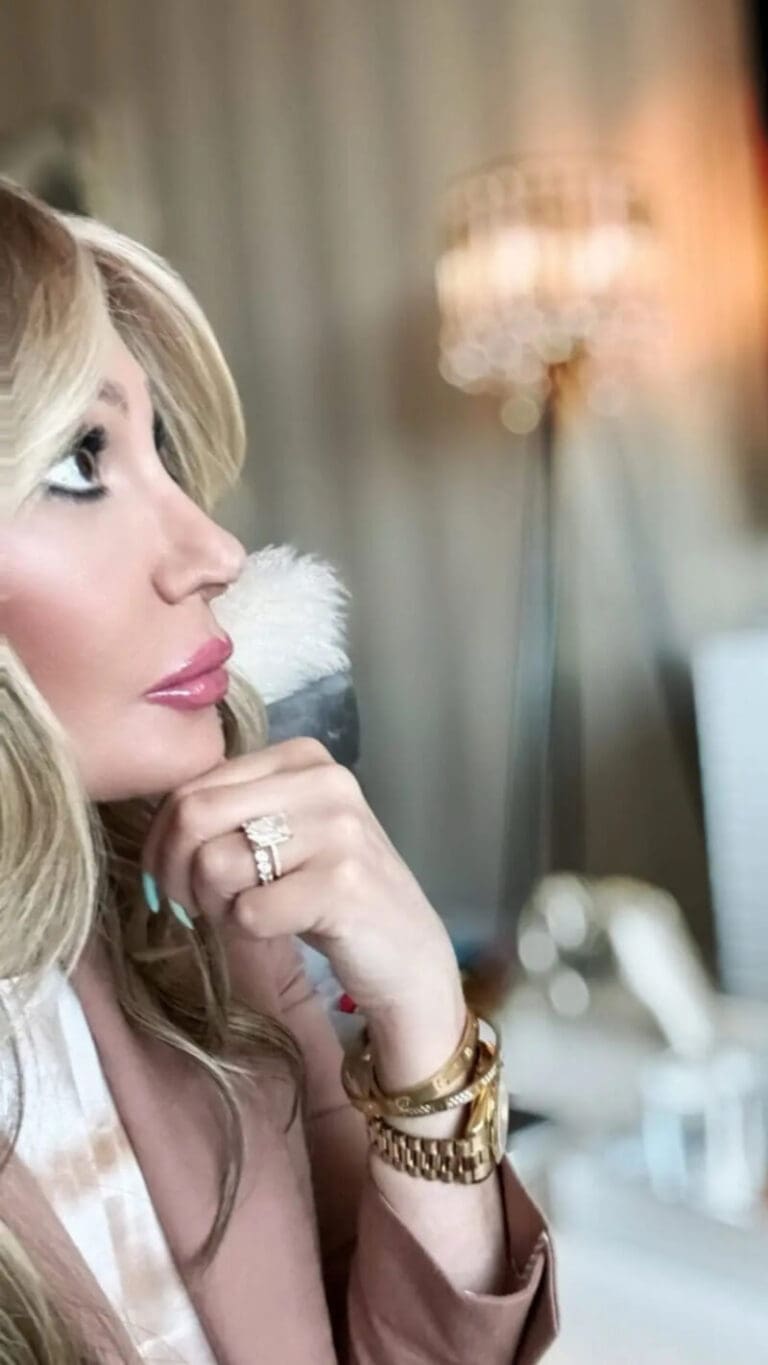 About Me – Dr. Sydney Ceruto in a candid, thoughtful moment in her professional MindLAB Neuroscience workspace