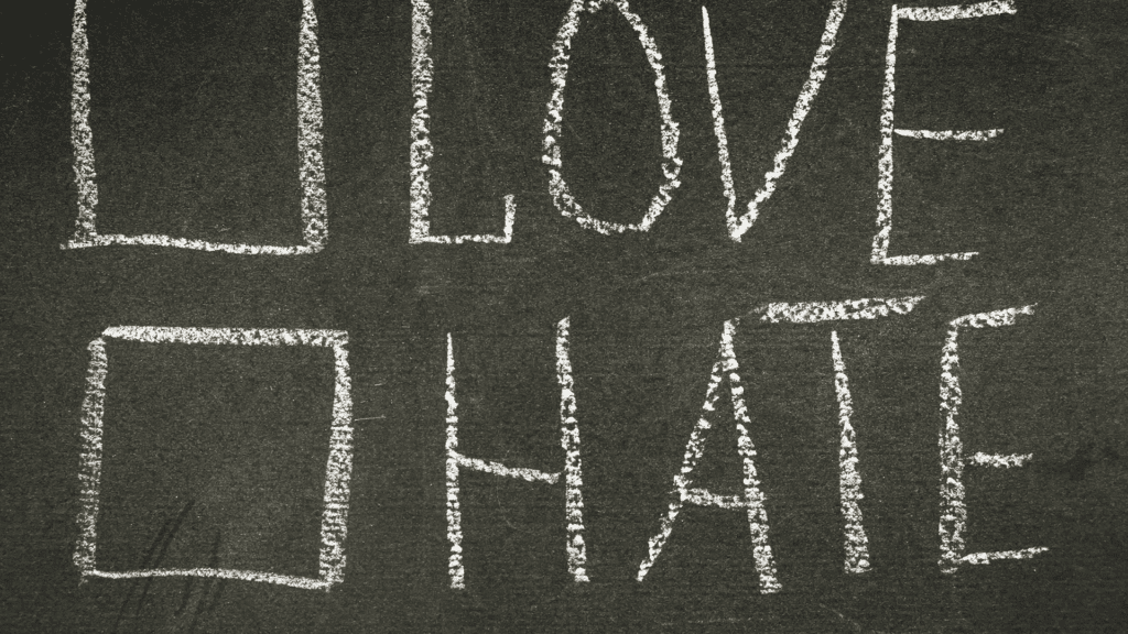 Chalkboard with the words "Love" and "Hate" written in chalk, symbolizing the emotional extremes often experienced in Borderline Personality Disorder.



