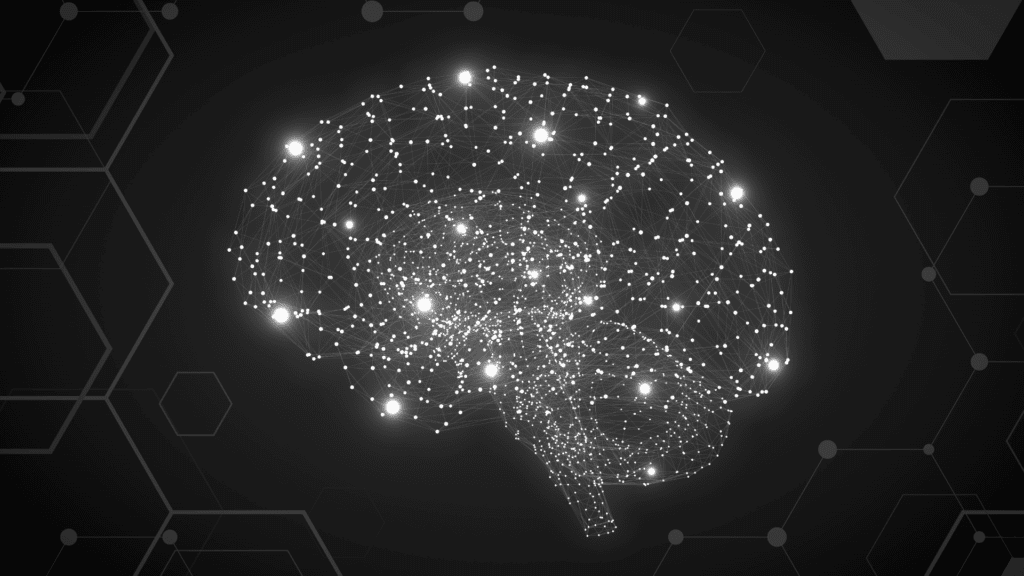Digital neural network in the shape of a brain glowing on a dark background, symbolizing the counterintuitiveness of the brain’s complex wiring.







