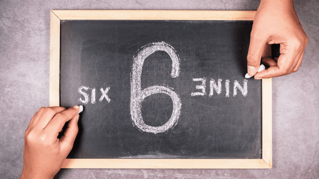 Chalkboard showing the number six and nine from different angles, representing the neuroscience of perspective




