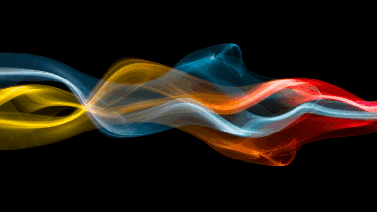 Colorful flowing lines on black background, illustrating the neuroscience of a flow state