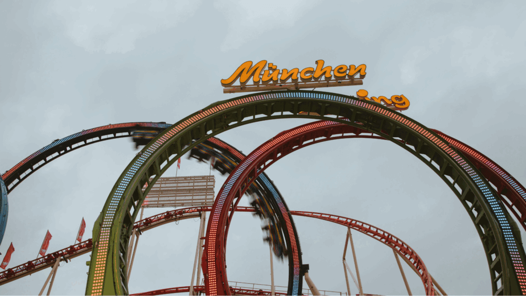 Rollercoaster with multiple loops symbolizing reward loops and the brain’s cycle of repeated behaviors.