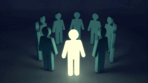 “Glowing figure standing among others, symbolizing confident decision-making in the Neuroscience of Adaptive Leadership.”