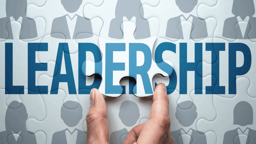 “Hands placing a final puzzle piece labeled leadership, symbolizing the integration of neuroscience into adaptive leadership practices.”