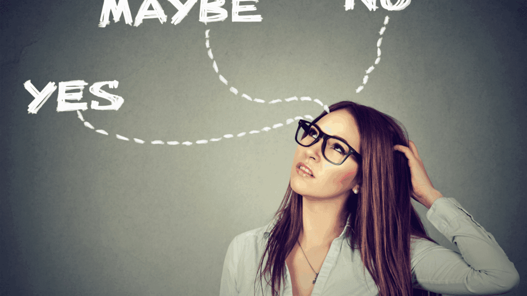 Thoughtful woman considering yes, maybe, or no, illustrating a decision-making moment in imposter syndrome leadership coaching.
