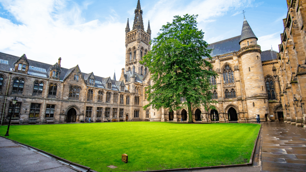 Historic stone university courtyard representing rigorous academic foundation of life coaching vs neuroscience coaching credentials



