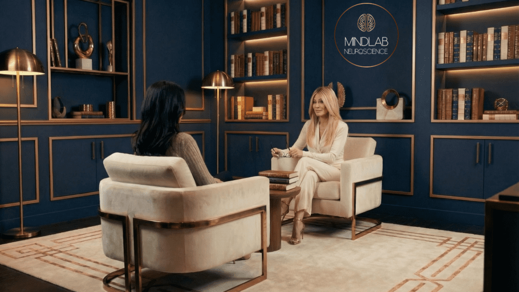 Dr. Sydney Ceruto conducts a professional neuroscience coaching session with MindLAB Neuroscience logo prominently displayed.